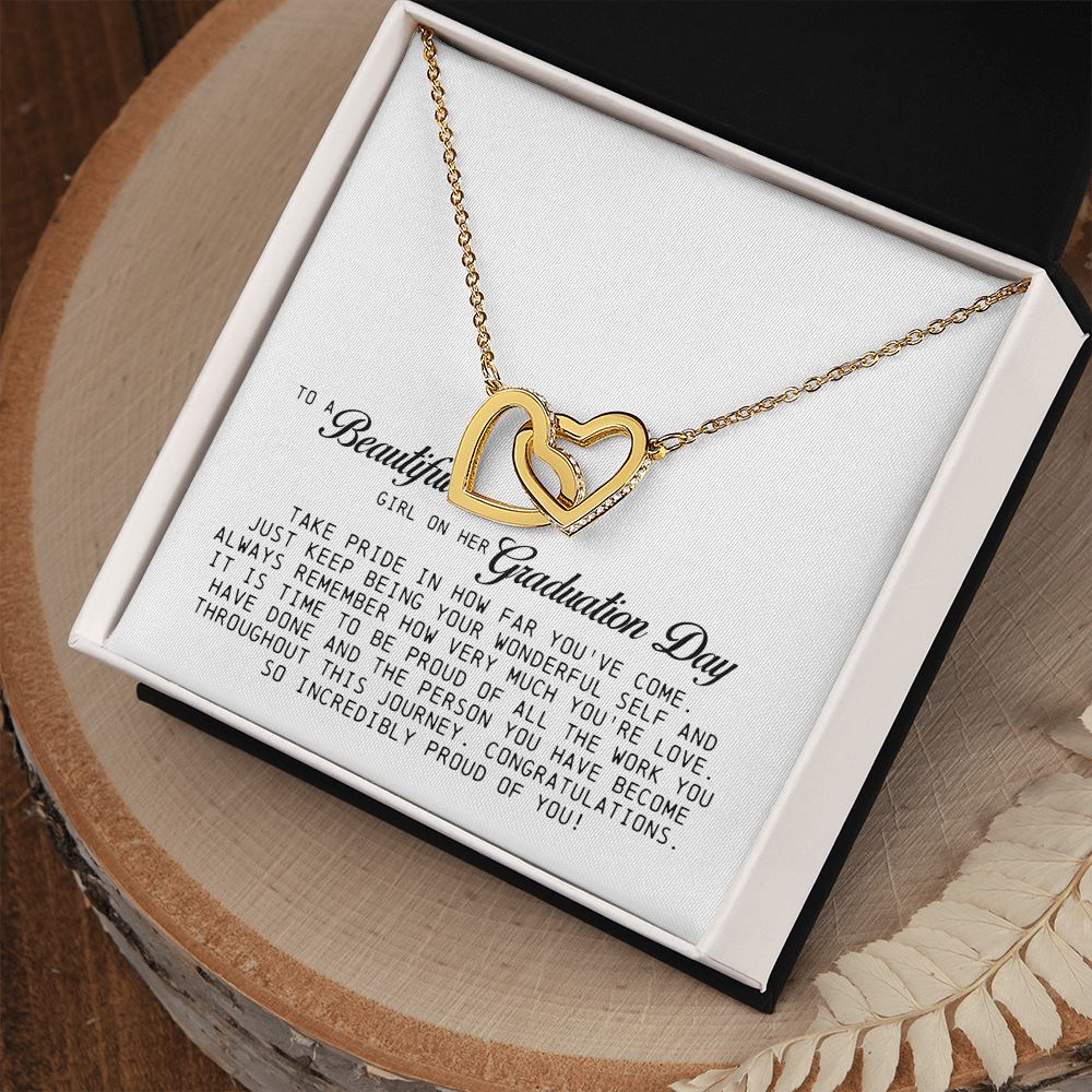 To a Beautiful Girl on Her Graduation Day, Interlocking Hearts Necklace