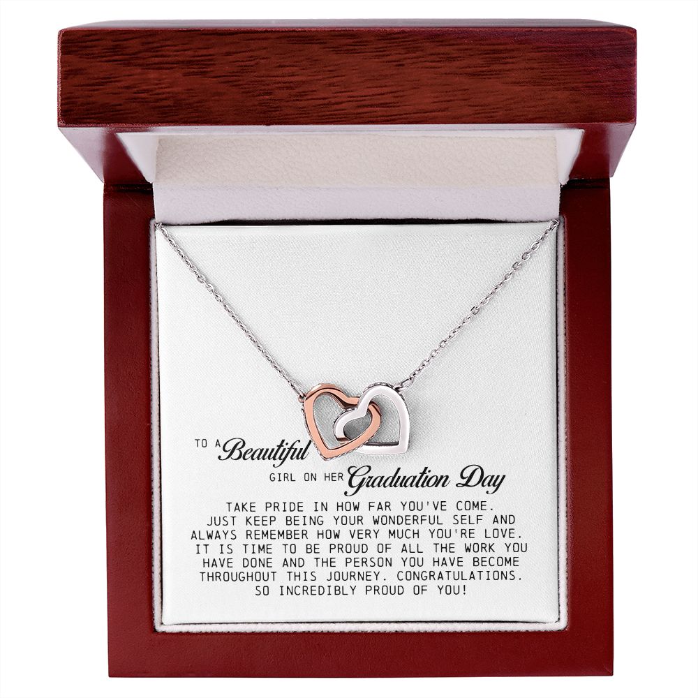 To a Beautiful Girl on Her Graduation Day, Interlocking Hearts Necklace